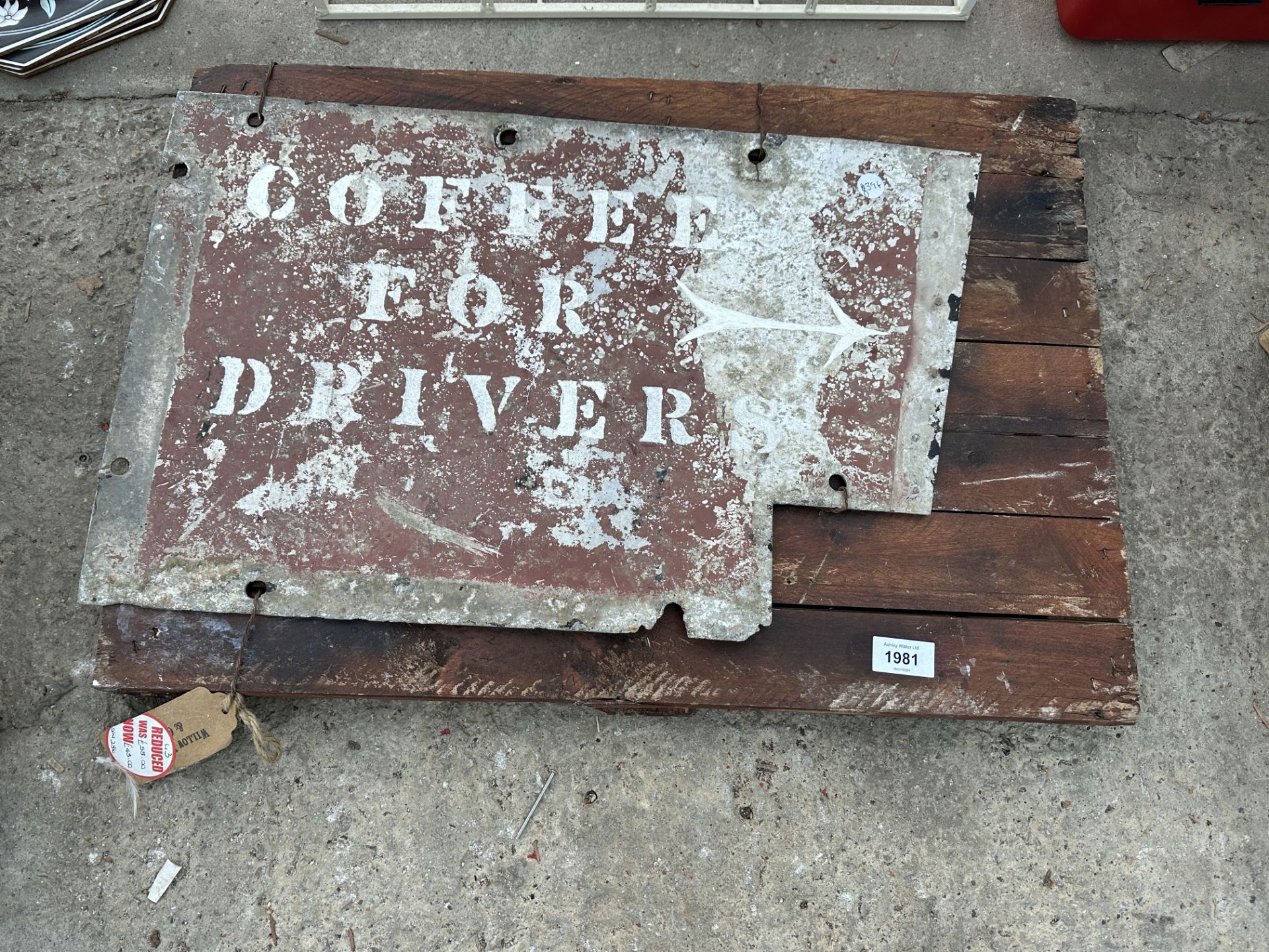 A VINTAGE METAL COFFEE SIGN WITH WOODEN MOUNT