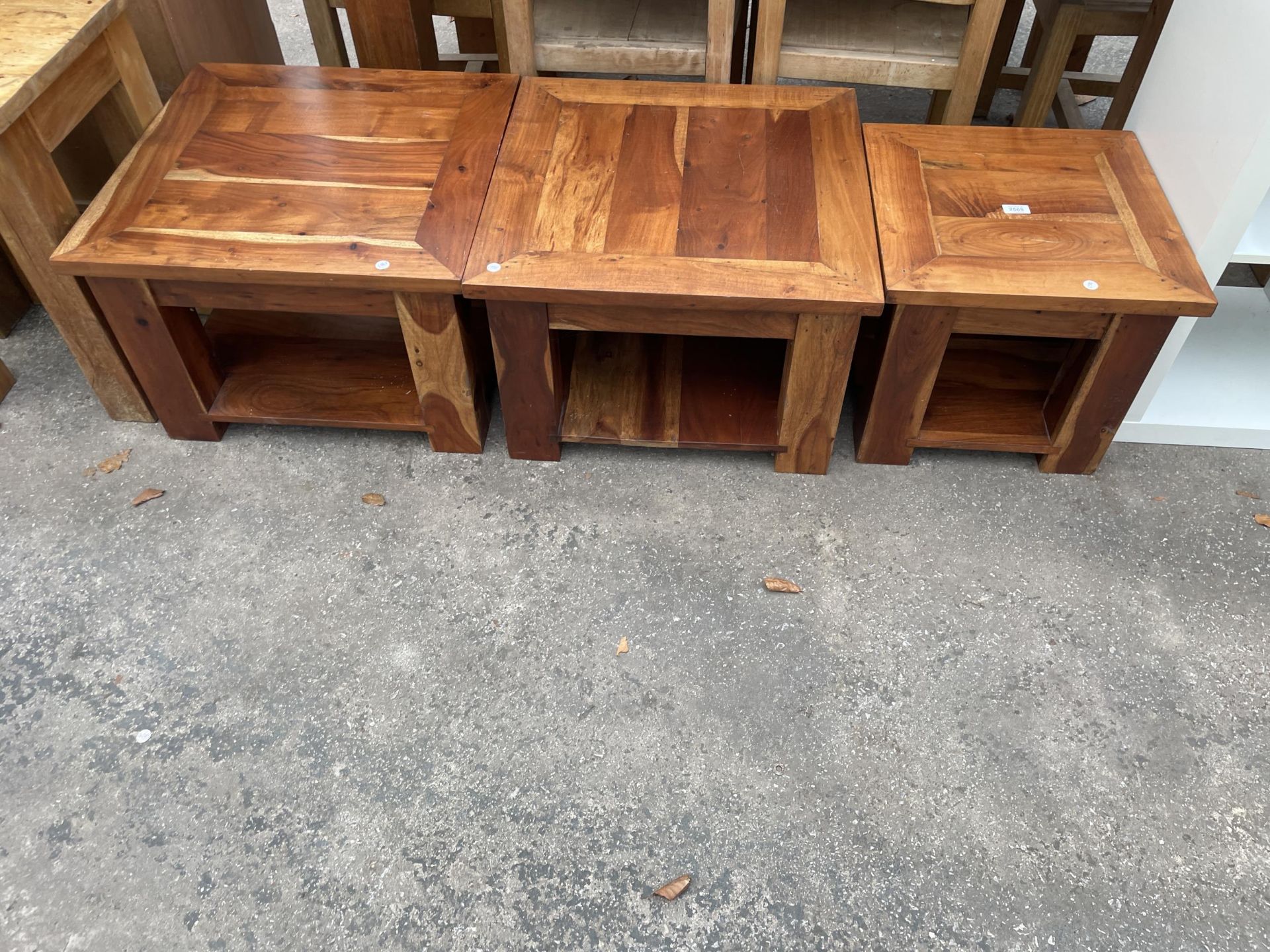 A PAIR OF HARDWOOD LAMP TABLES, 24" SQUARE EACH AND A SMALLER TABLE 18" SQUARE