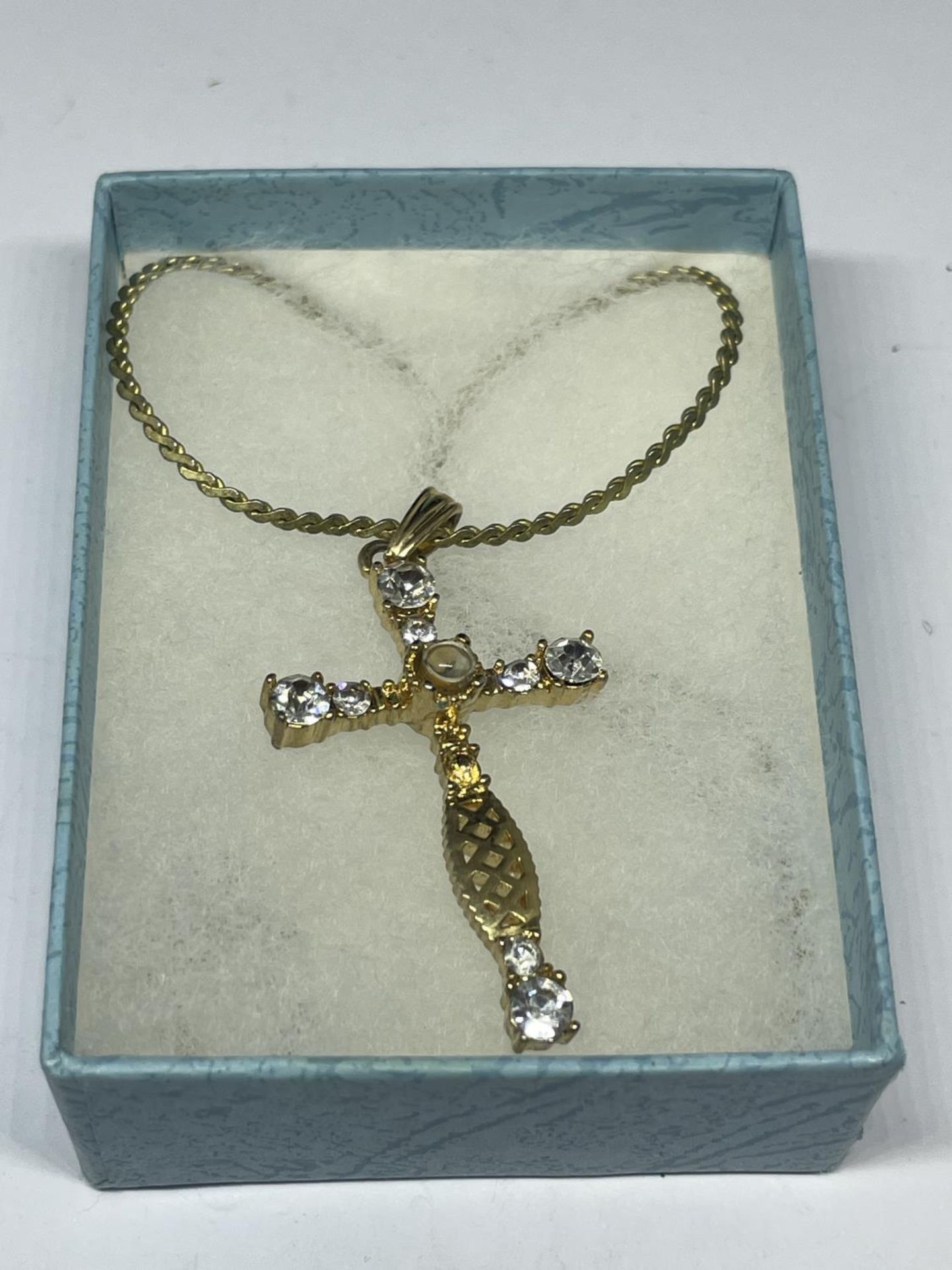 A SWAROVSKI CROSS CRYSTAL NECKLACE