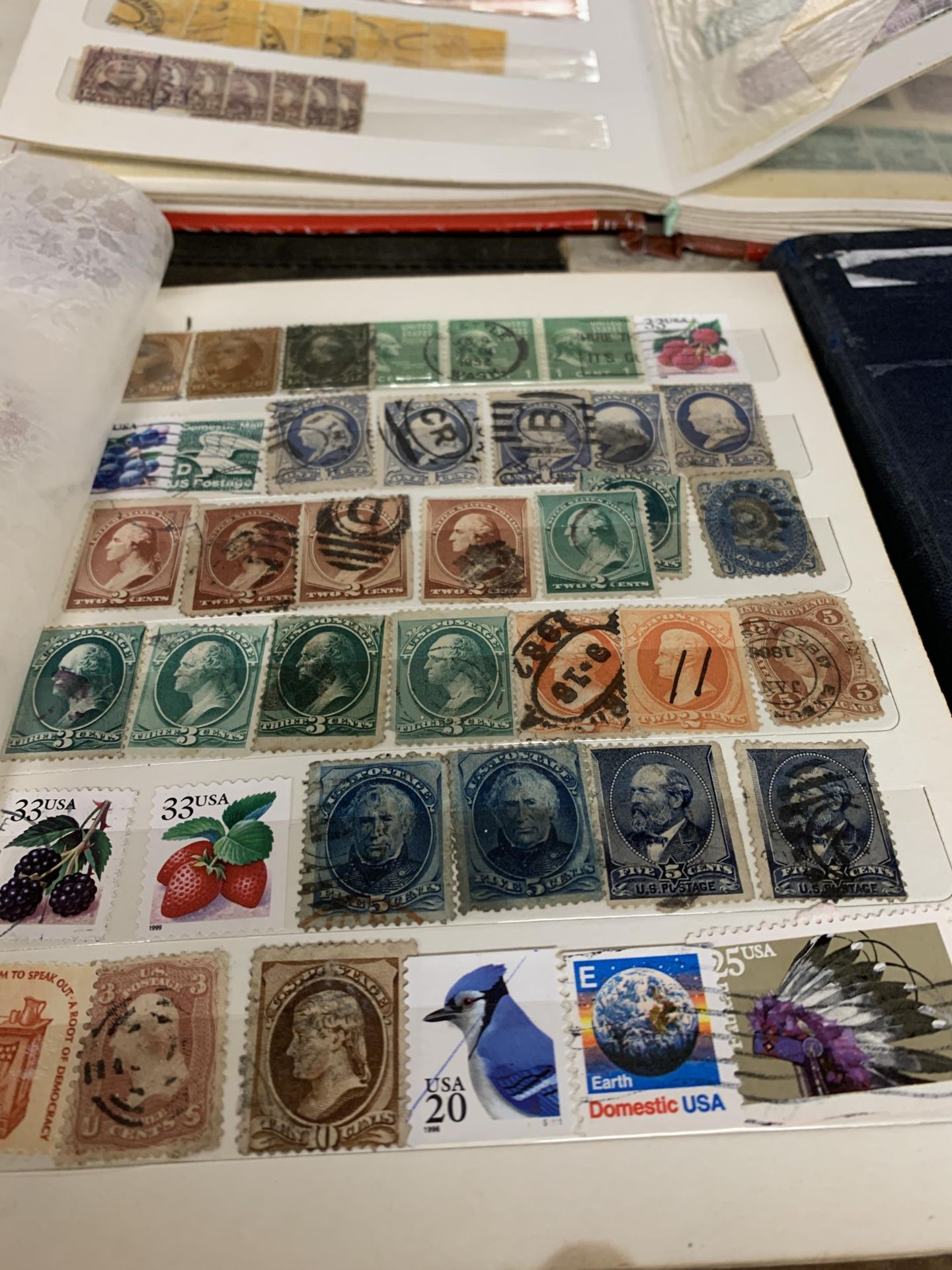 SEVEN STAMP ALBUMS CONTAINING A QUANTITY OF FOREIGN AND BRITISH STAMPS - Image 3 of 6