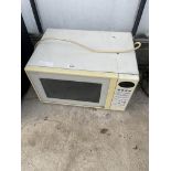 A WHITE MICROWAVE OVEN