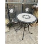 A METAL AND TILED BISTRO SET COMPRISING OF A ROUND TABLE AND TWO CHAIRS