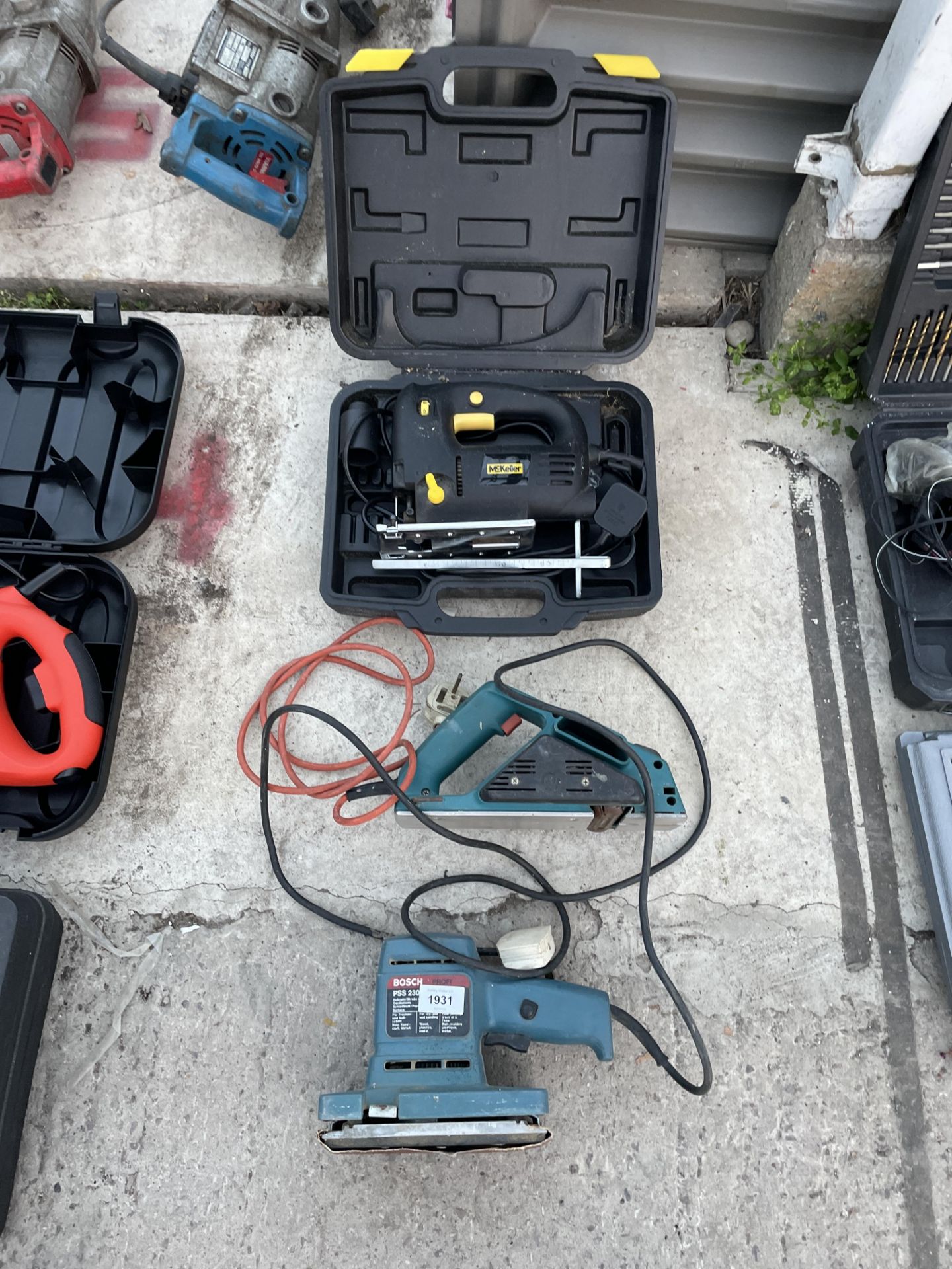 A MCKELLER ELECTRIC JIGSAW, A BOSCH ELECTRIC SANDER AND AN ELECTRIC WOOD PLANE