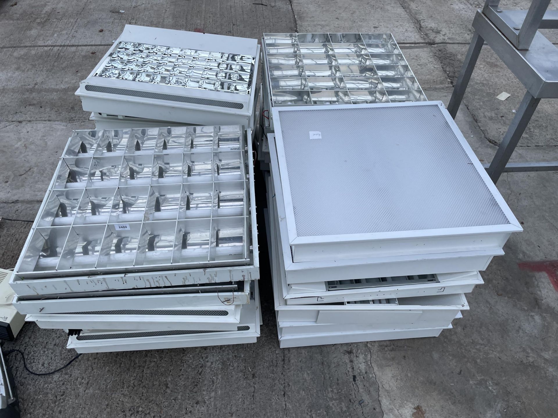 TWENTY FOUR CIELING PANEL LIGHT FITTINGS