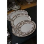 A QUANTITY OF FRANK HAVILAND, LIMOGES, BOOTHS LTD, LARGE SERVING BOWLS AND PLATES - 5 IN TOTAL