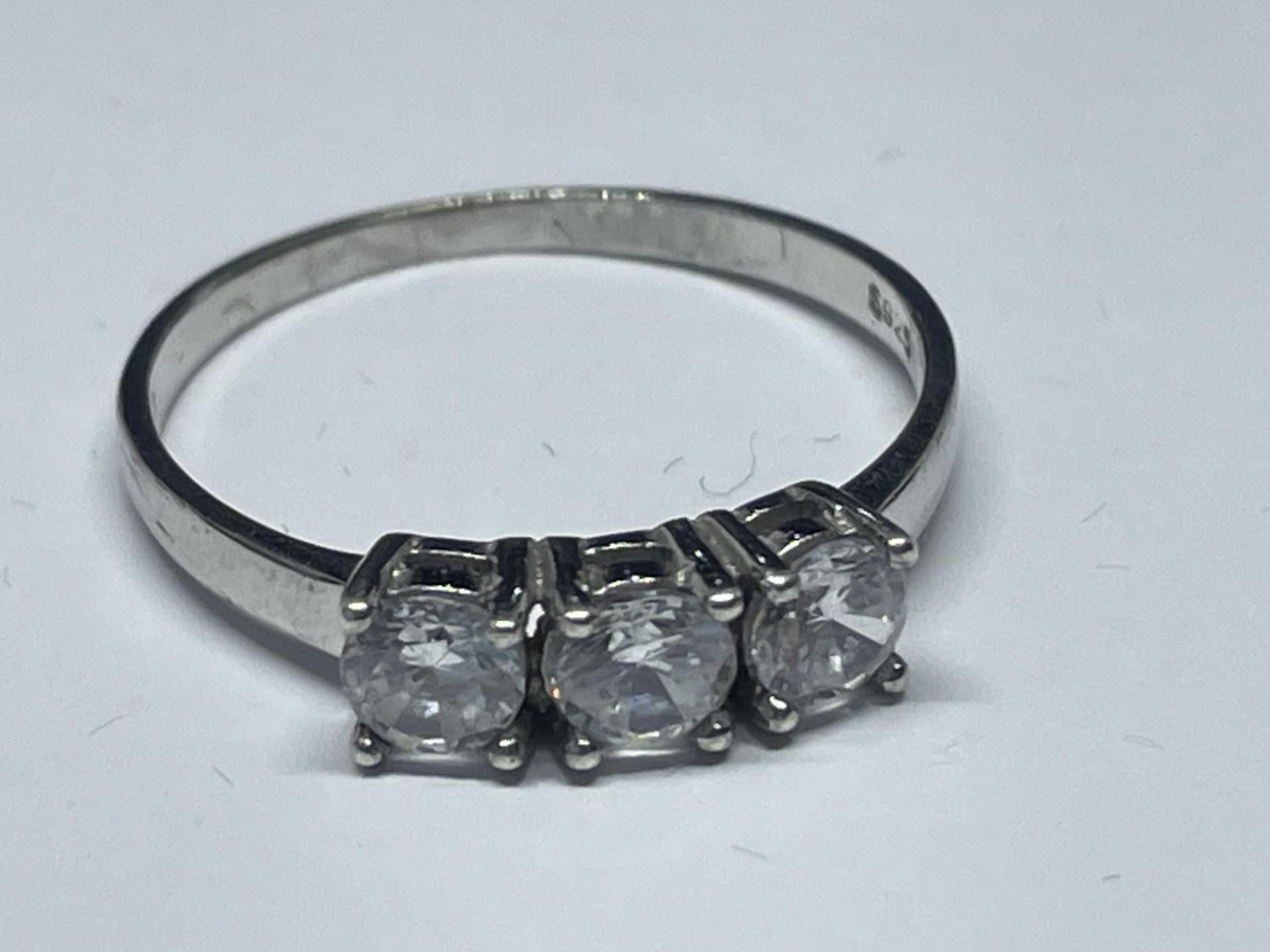 A LADIES SILVER DRESS RING, BOXED