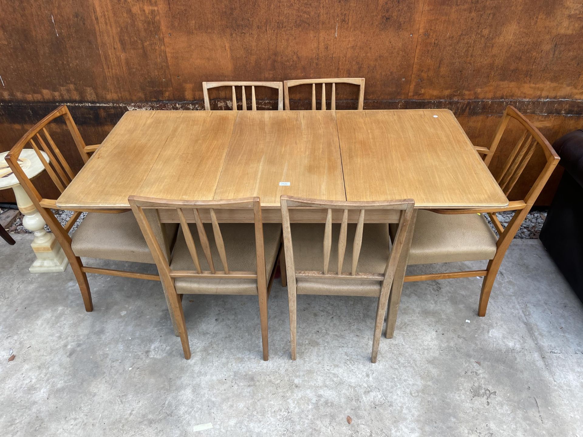 A GORDON RUSSELL RETRO TEAK EXTENDING DINING TABLE, 42 X 31" (LEAF 18") AND SIX DINING CHAIRS, TWO