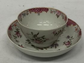 A LATE 18TH/EARLY 19TH CENTURY CHINESE EXPORT FAMILLE ROSE TEA BOWL AND SAUCER - TWO FAINT