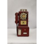 AN UNUSUAL USA VINTAGE TIN PLATE PHONE MONEY BOX, HEIGHT 33CM