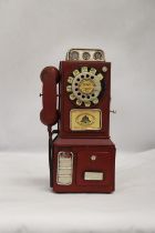 AN UNUSUAL USA VINTAGE TIN PLATE PHONE MONEY BOX, HEIGHT 33CM