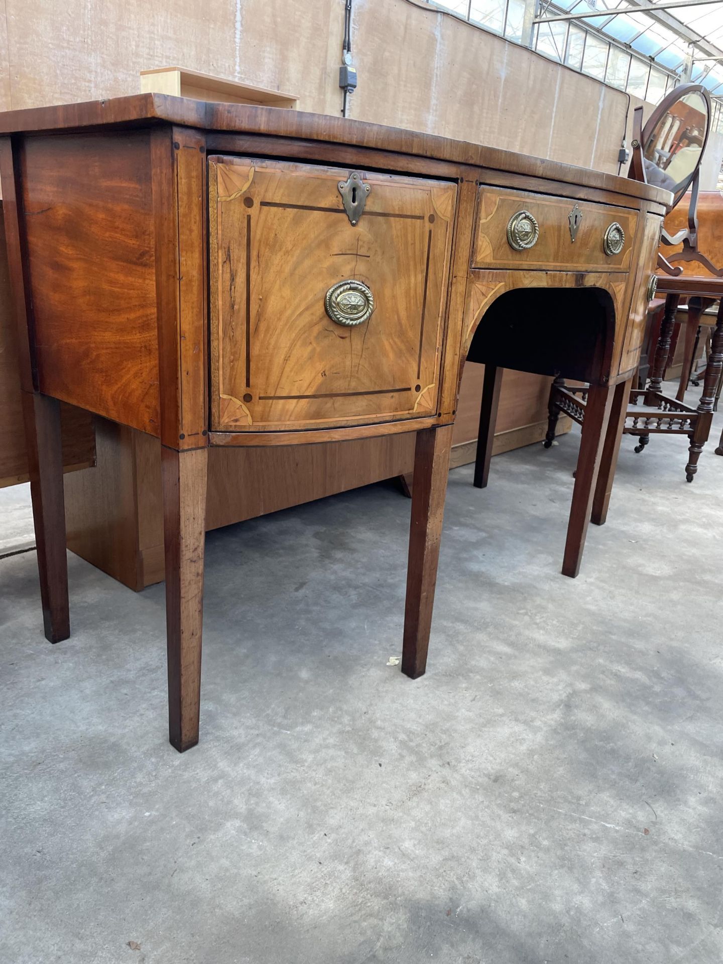 A 19TH CENTURY MAHOGANY INLAID AND CROSSBANDED BOWFRONTED SIDEBOARD ENCLOSING THREE DRAWERS, 60" - Image 2 of 7