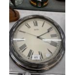 A VINTAGE STYLE, BATTERY OPERATED, ACCTIM WALL CLOCK, DIAMETER 36CM