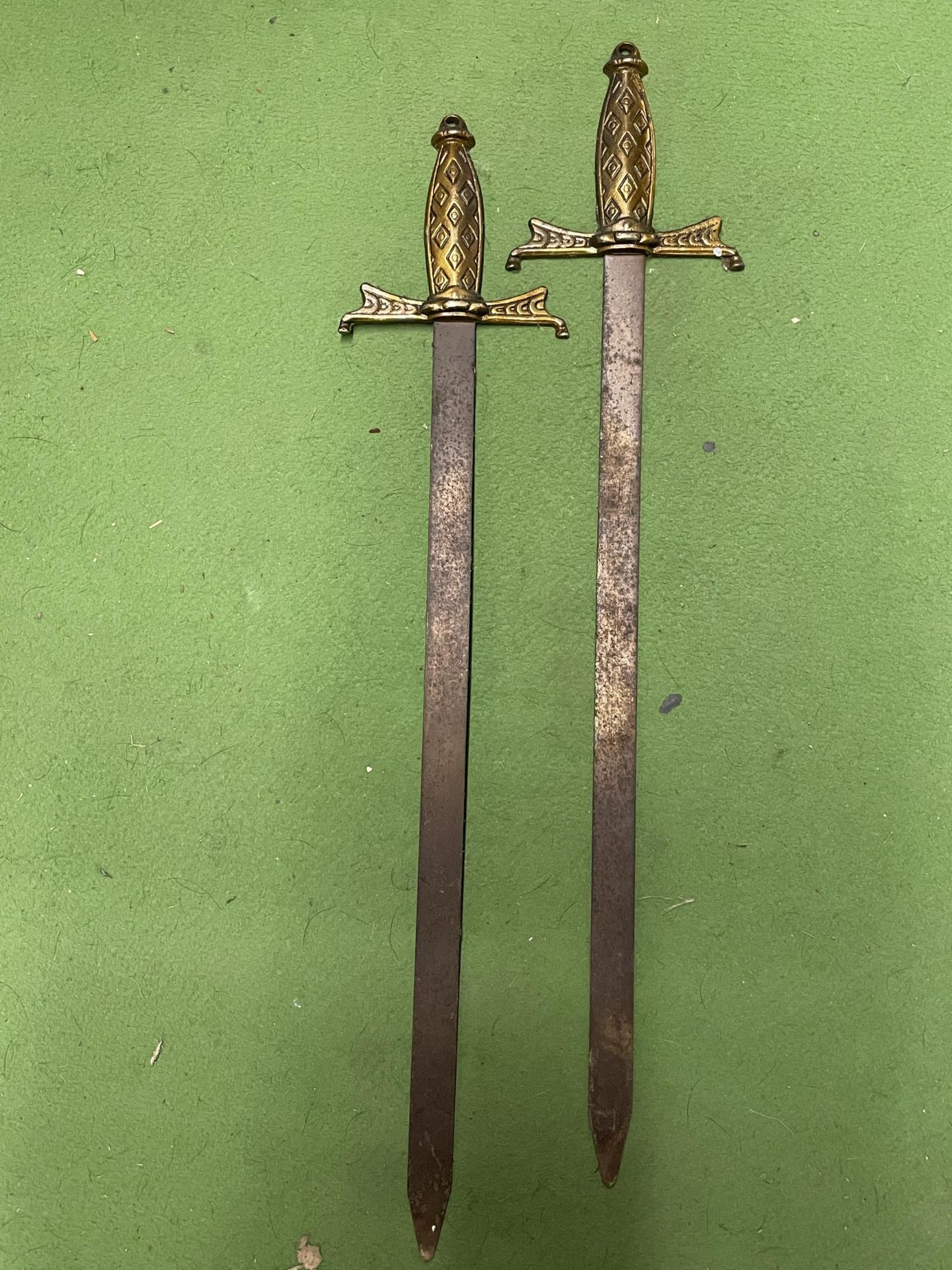 A PAIR OF VINTAGE SWORDS