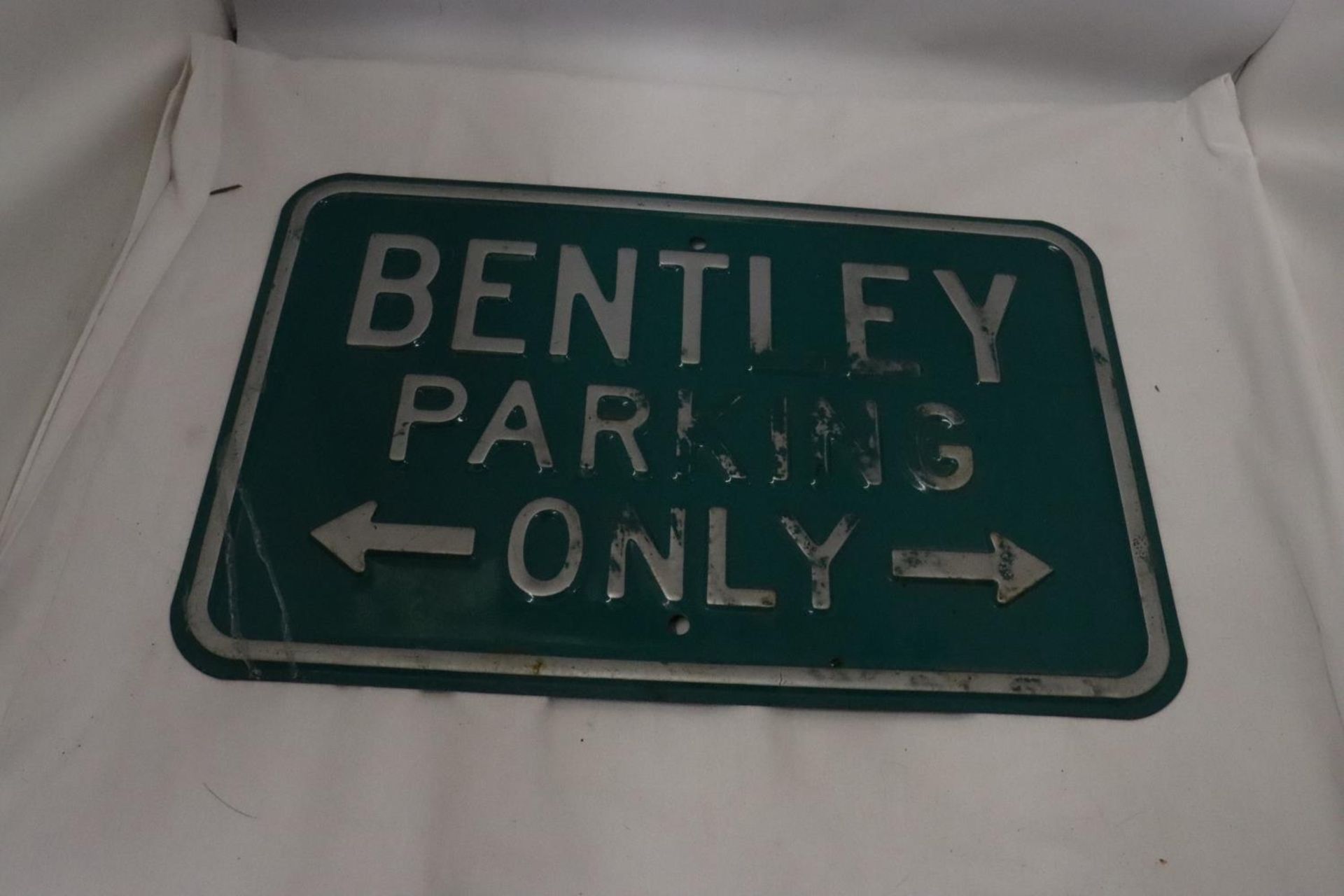 A METAL 'BENTLEY PARKING ONLY' SIGN, 45CM X 30CM