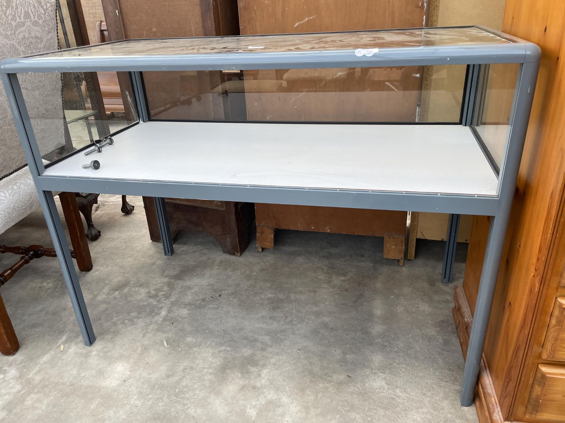 A MODERN METALWARE FRAMED GLASS DISPLAY COUNTER, 47 X 24" - Image 2 of 2