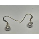 A PAIR OF 14 CARAT GOLD AND PEARL EARRINGS GROSS WEIGHT .95 GRAMS