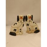 A PAIR OF ARTHUR WOOD STAFFORDSHIRE SPANIELS, HEIGHT 20CM