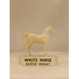 A VINTAGE KELSBORO WARE CERAMIC WHITE HORSE WHISKY ADVERTISING FIGURE