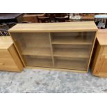 A MODERN OAK GORDON RUSSELL STORAGE CABINET WITH TWO GLASS SLIDING DOORS, 59" WIDE