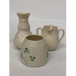 A BELLEEK LILY OF THE VALLEY SPILL VASE TOGETHER WITH A DOUBLE SPOUT CREAMER AND SHAMROCK POT