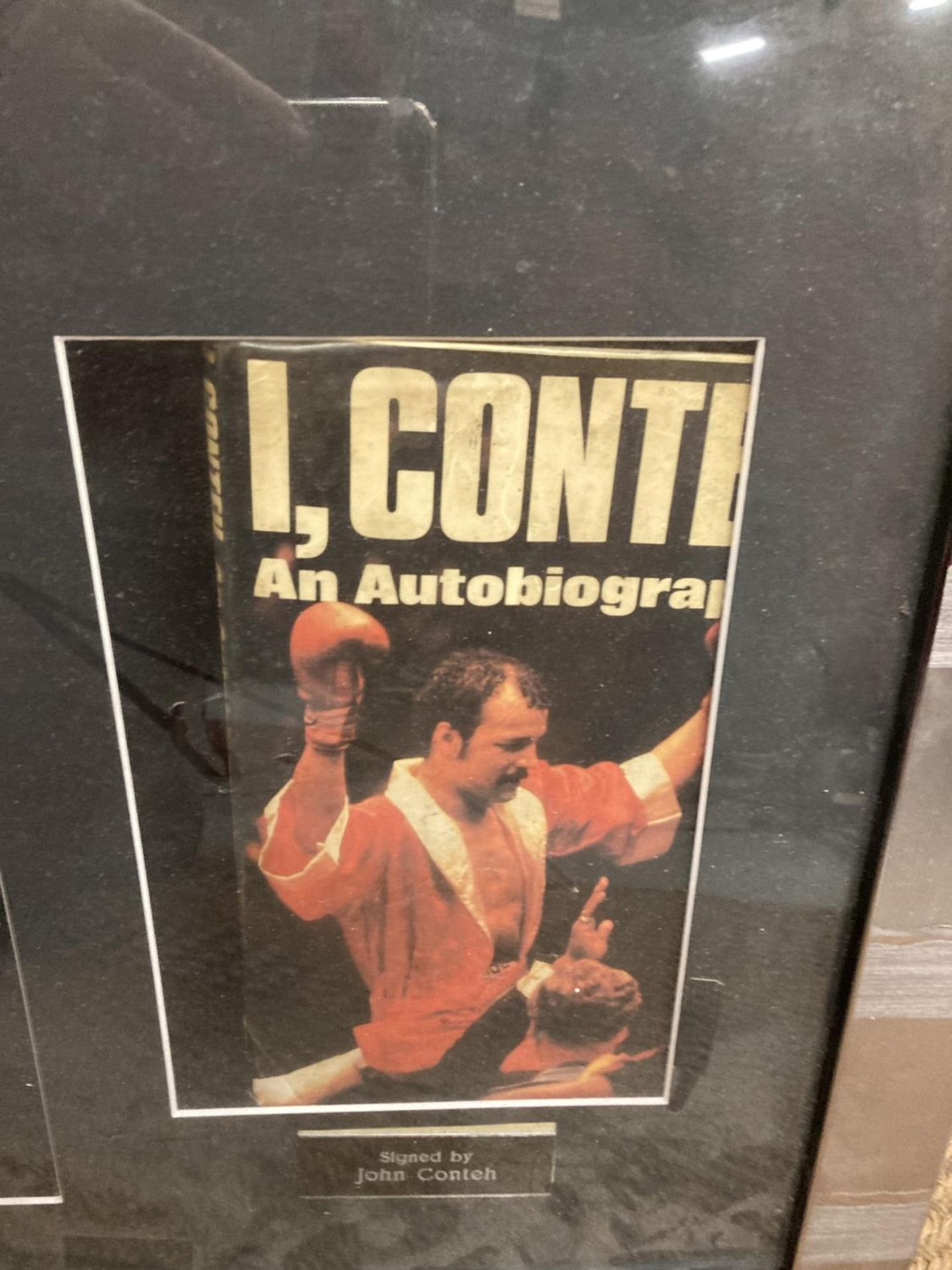 A FRAMED & SIGNED JOHN CONTEH BOXING GLOVE & AUTOBIOGRAPHY BOOK - Image 2 of 5