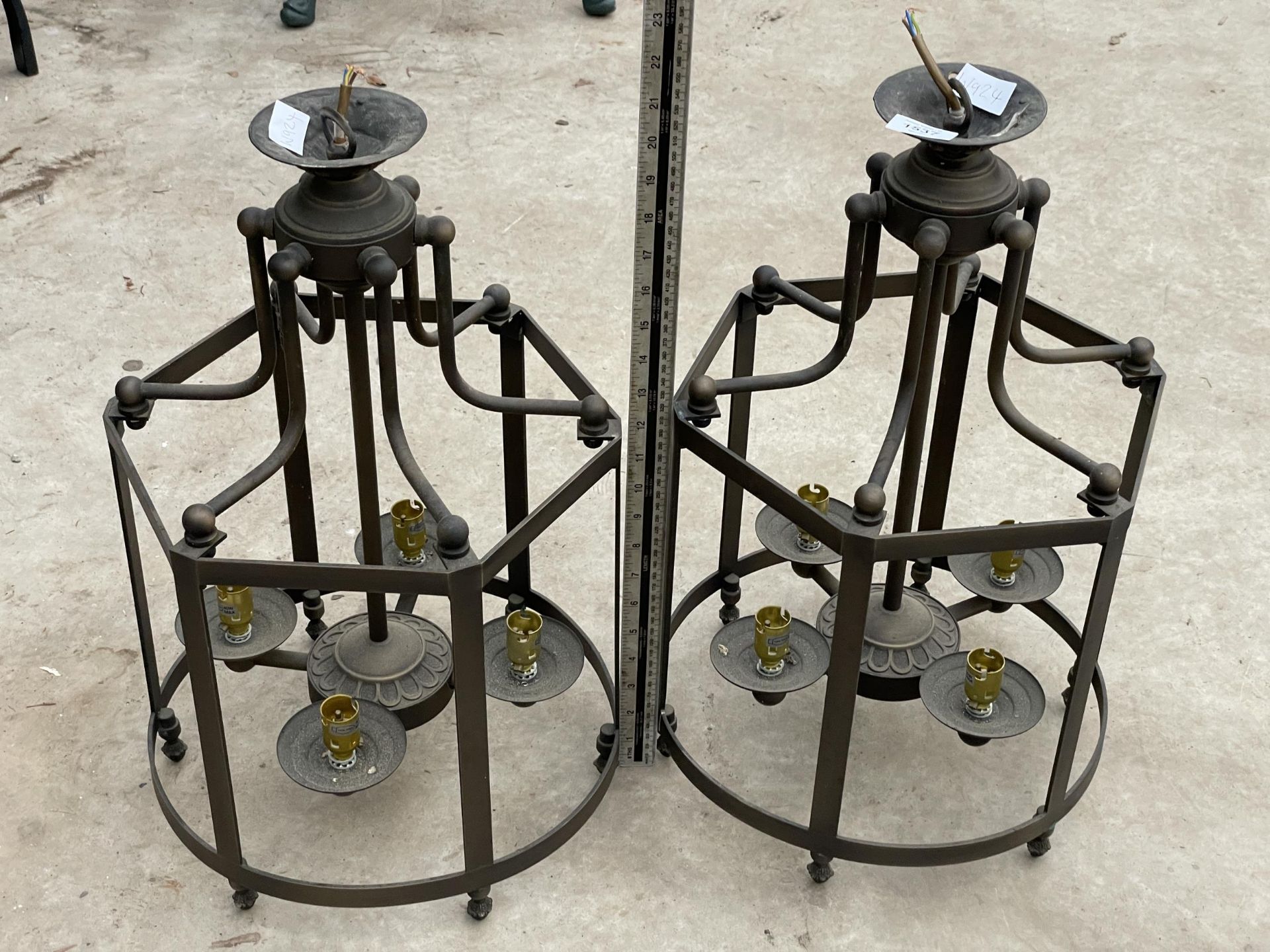 A PAIR OF METAL DECORATIVE CIELING LIGHT FITTINGS