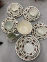 AN ANTIQUE CHINA PART TEASET TO INCLUDE A CAKE PLATE, SUGAR BOWL, CREAM JUG, CUPS, SAUCERS AND