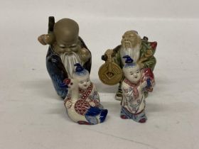 FOUR ORIENTAL FIGURES