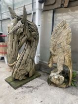 TWO DECORATIVE WOODEN GARDEN FEATURES TO INCLUDE A DRIFT WOOD HORSE AND A CARVED EAGLE