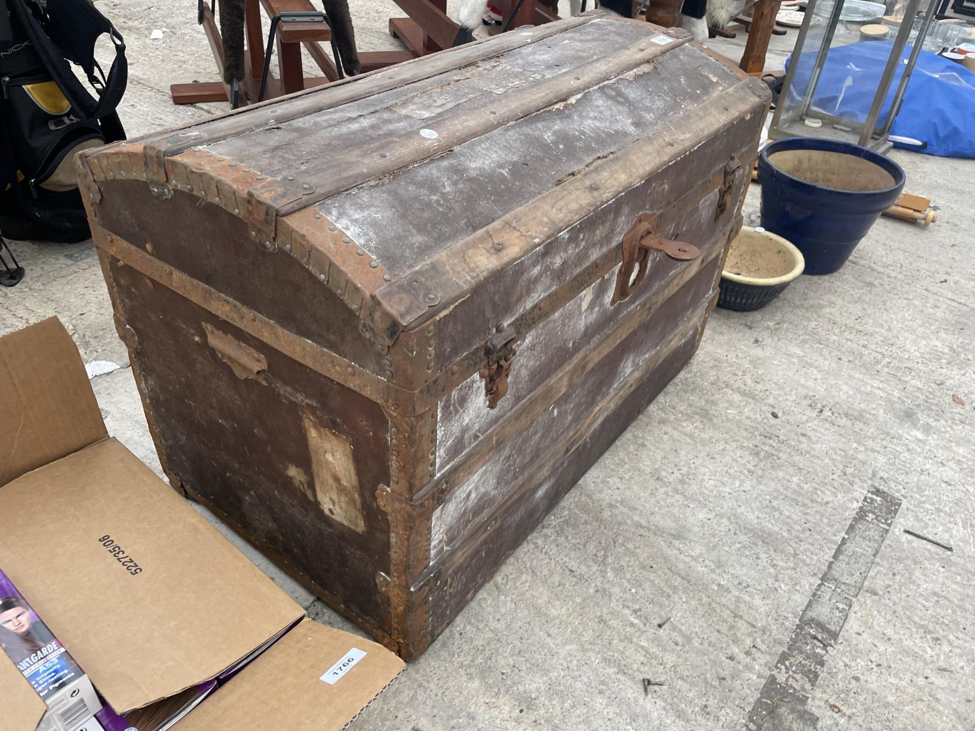 A VINTAGE DOMED TRAVEL TRUNK WITH METAL BANDING - Image 2 of 3