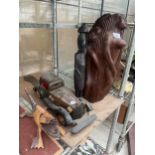 AN ASSORTMENT OF ITEMS TO INCLUDE A TREEN CARVED FIGURE, A WOODEN CAR AND A CROCODILE ETC