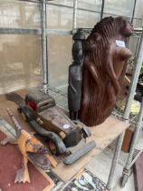 AN ASSORTMENT OF ITEMS TO INCLUDE A TREEN CARVED FIGURE, A WOODEN CAR AND A CROCODILE ETC
