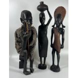 A GROUP OF THREE VINTAGE CARVED TRIBAL AFRICAN HARDWOOD FIGURES, HEIGHT 37 CM