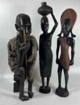 A GROUP OF THREE VINTAGE CARVED TRIBAL AFRICAN HARDWOOD FIGURES, HEIGHT 37 CM