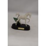 A ROYAL DOULTON FIGURE OF A FOAL, 'SPRINGTIME' ON A WOODEN PLINTH