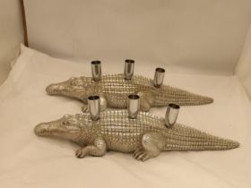 A PAIR OF HEAVY SILVER COLOURED CROCODILE CANDLE HOLDERS, LENGTH 44CM