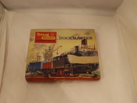 A VINTAGE TRI-ANG DOCKMASTER CLOCKWORK TRAIN SET - BOXED