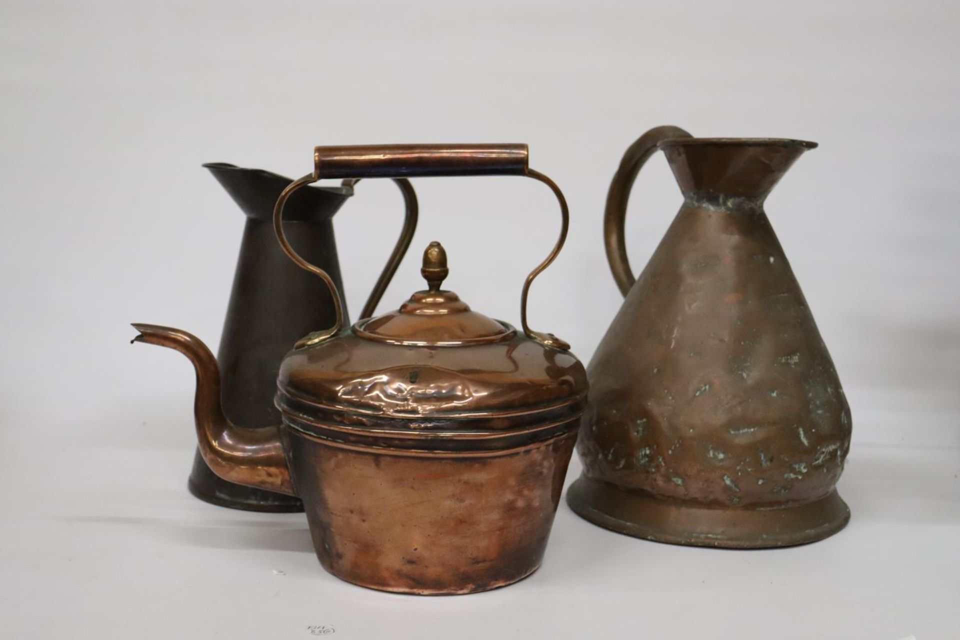 THREE VINTAGE COPPER ITEMS TO INCLUDE A GALLON JUG, SMALLER JUG AND A COPPER KETTLE