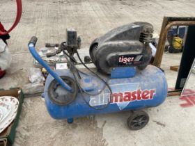 AN ELECTRIC AIRMASTER TIGER 8/65 TURBOR AIR COMPRESSOR