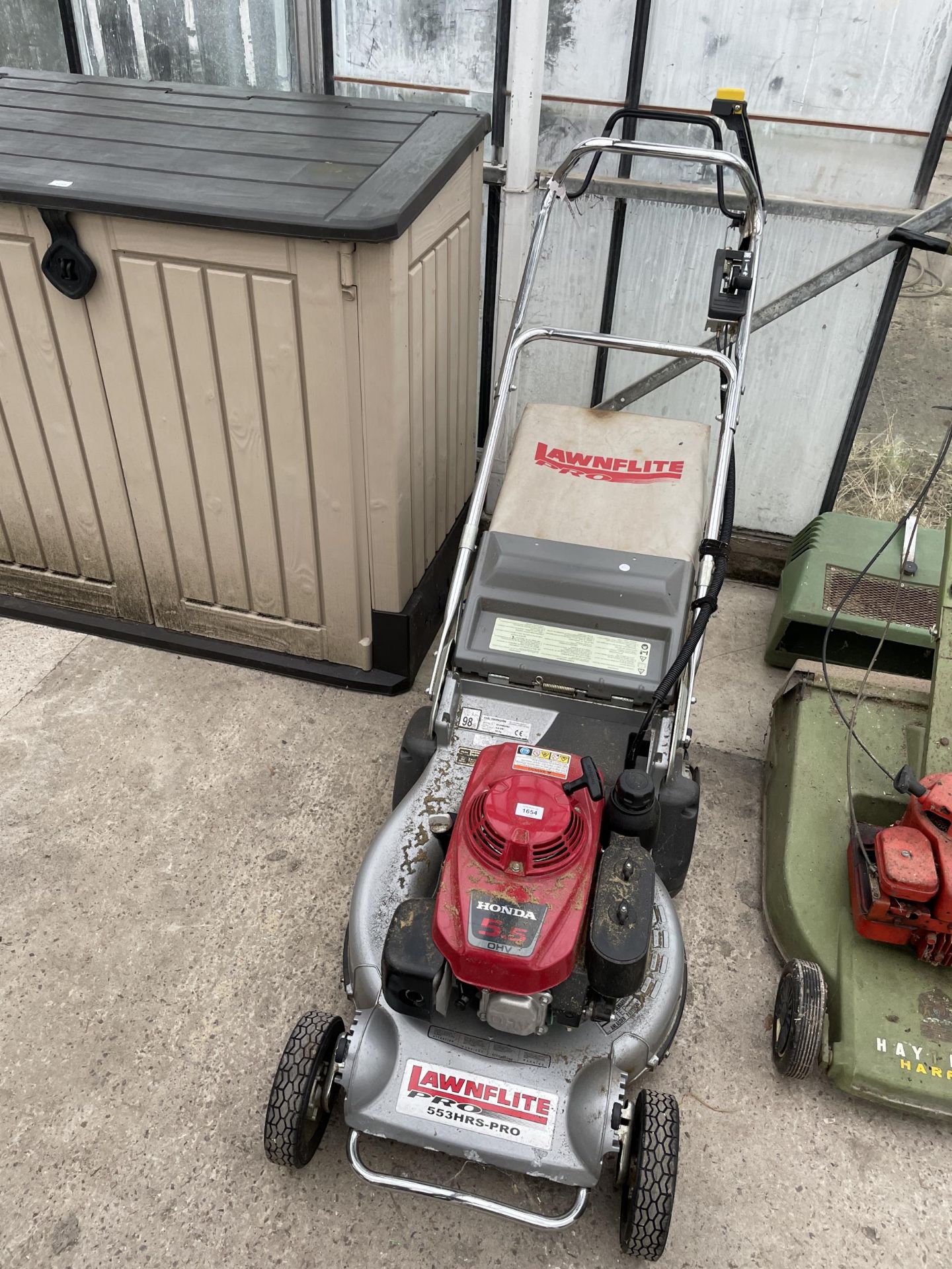 A LAWNFLITE PRO 553 ROTARY MOWER WITH HONDA ENGINE AND GRASS BOX