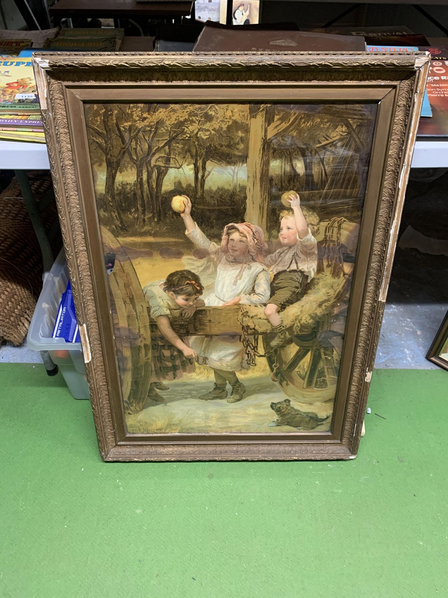 A FRAMED OIL ON PAPER OF A CHILDREN'S SCENE