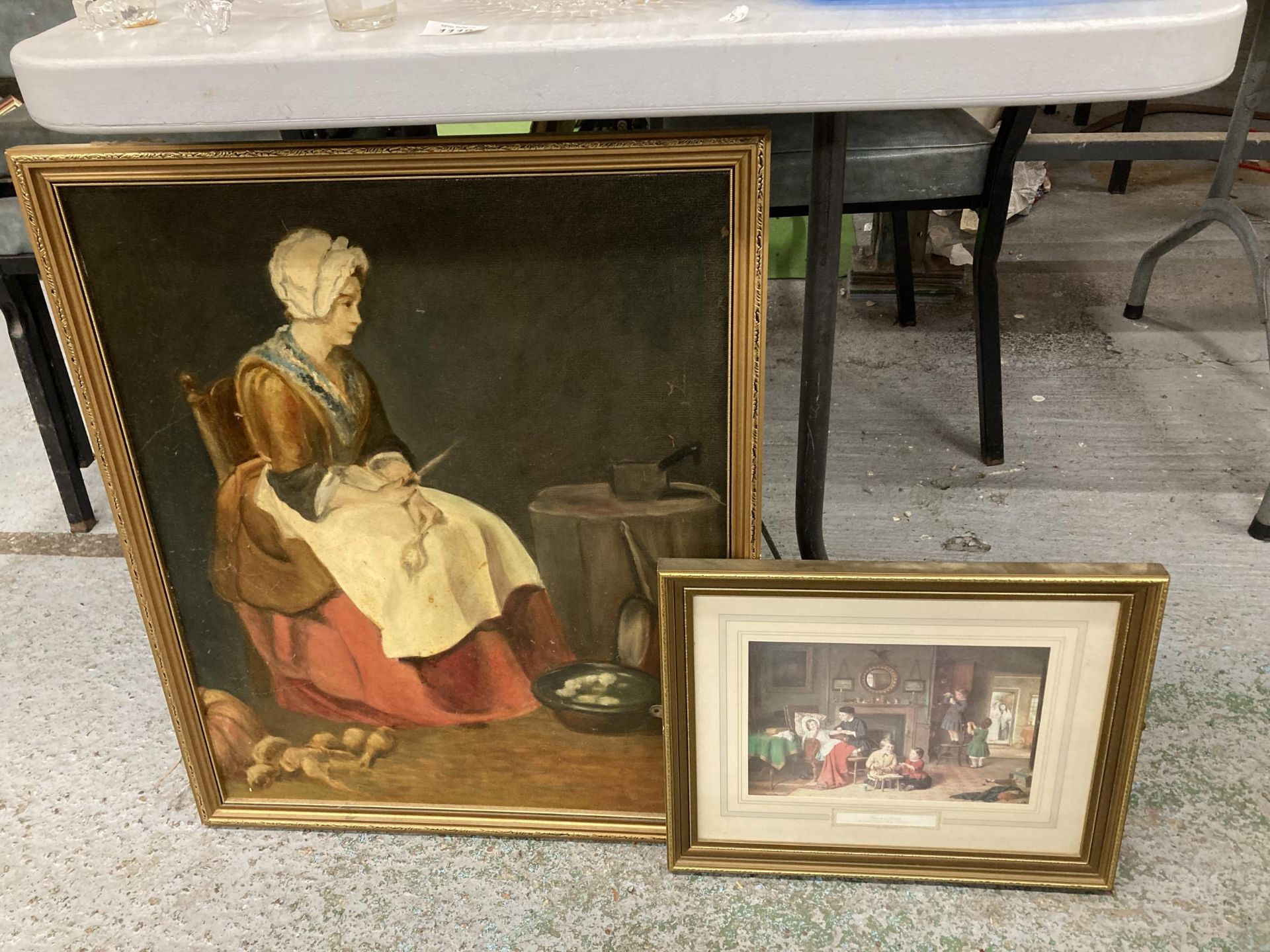 A FRAMED OIL ON BOARD OF A LADY TOGETHER WITH A FRAMED PRINT