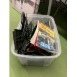 A SCALEXTRIC TRACK TOGETHER WITH BOOKLETS AND POWERPACK