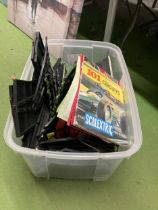 A SCALEXTRIC TRACK TOGETHER WITH BOOKLETS AND POWERPACK