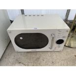 A WHITE DAEWOO MICROWAVE OVEN