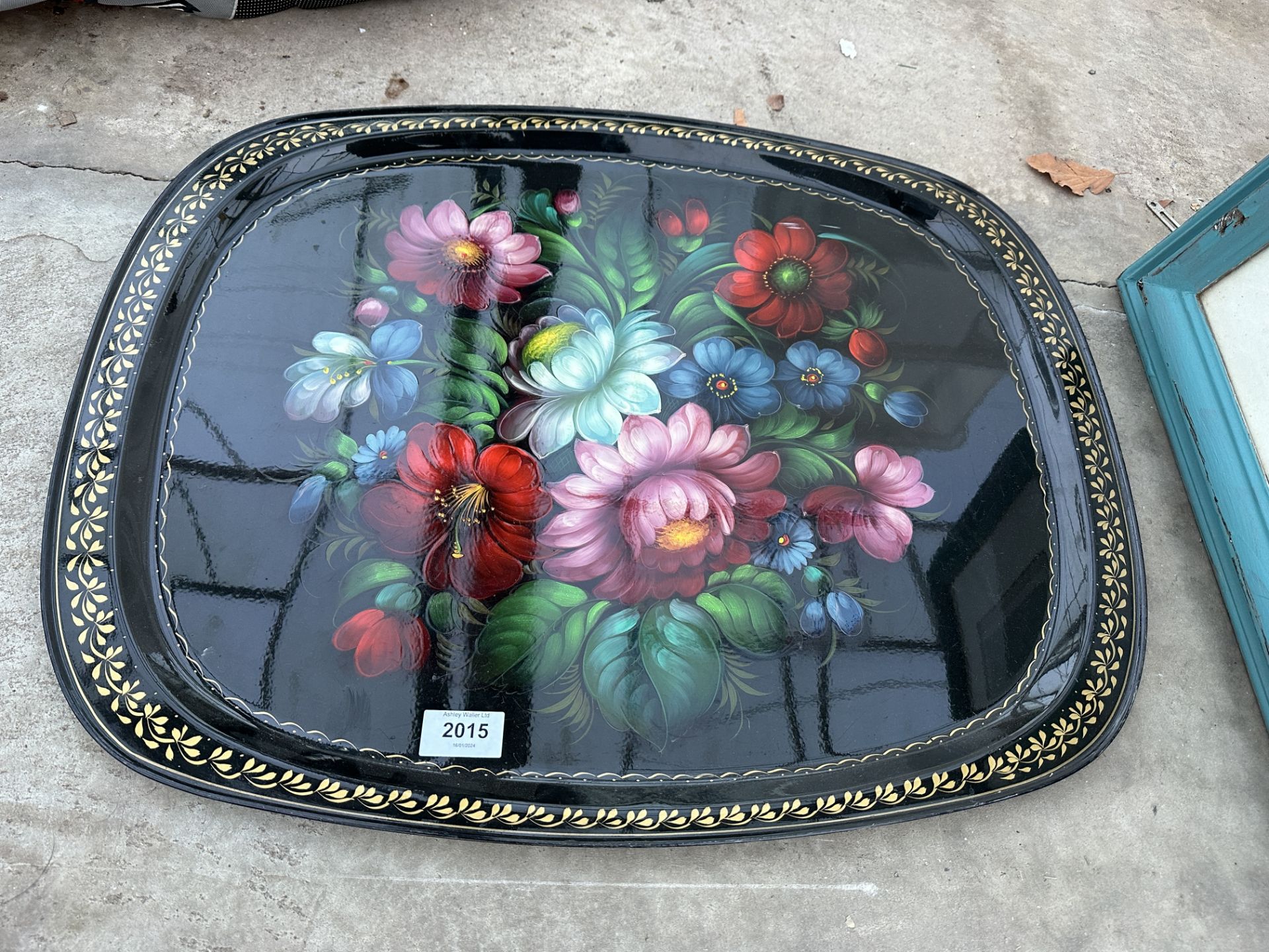 A METAL HANDPAINTED SERVING TRAY