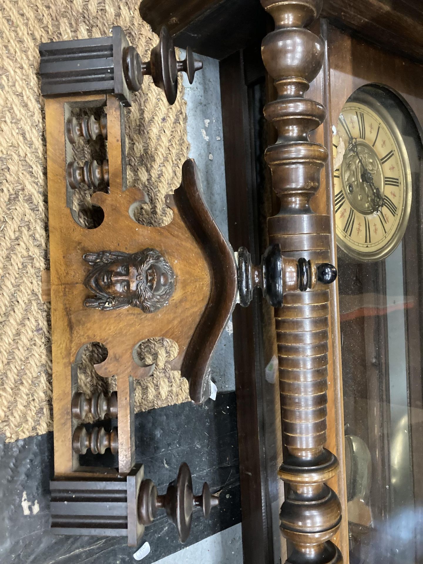 A CARVED WALNUT VIENNA WALL CLOCK WITH ROMAN NUMERALS AND PENDULUM - Image 4 of 4