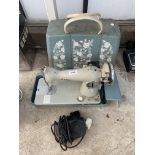 A RETRO JONES ELECTRIC SEWING MACHINE WITH FOOT PEDAL AND CARRY CASE