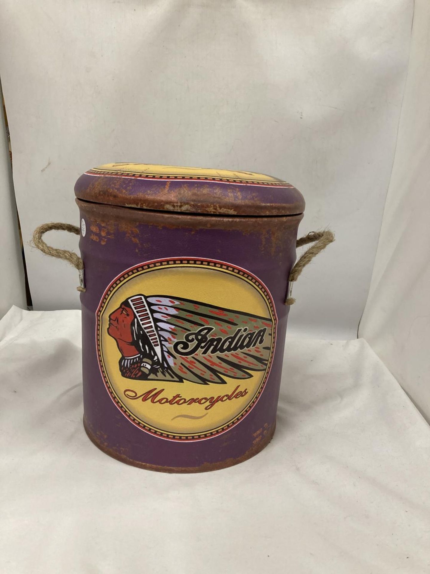 AN INDIAN MOTORCYCLES MOBILE UTILITY STOOL WITH PADDED TOP, HEIGHT 31CM