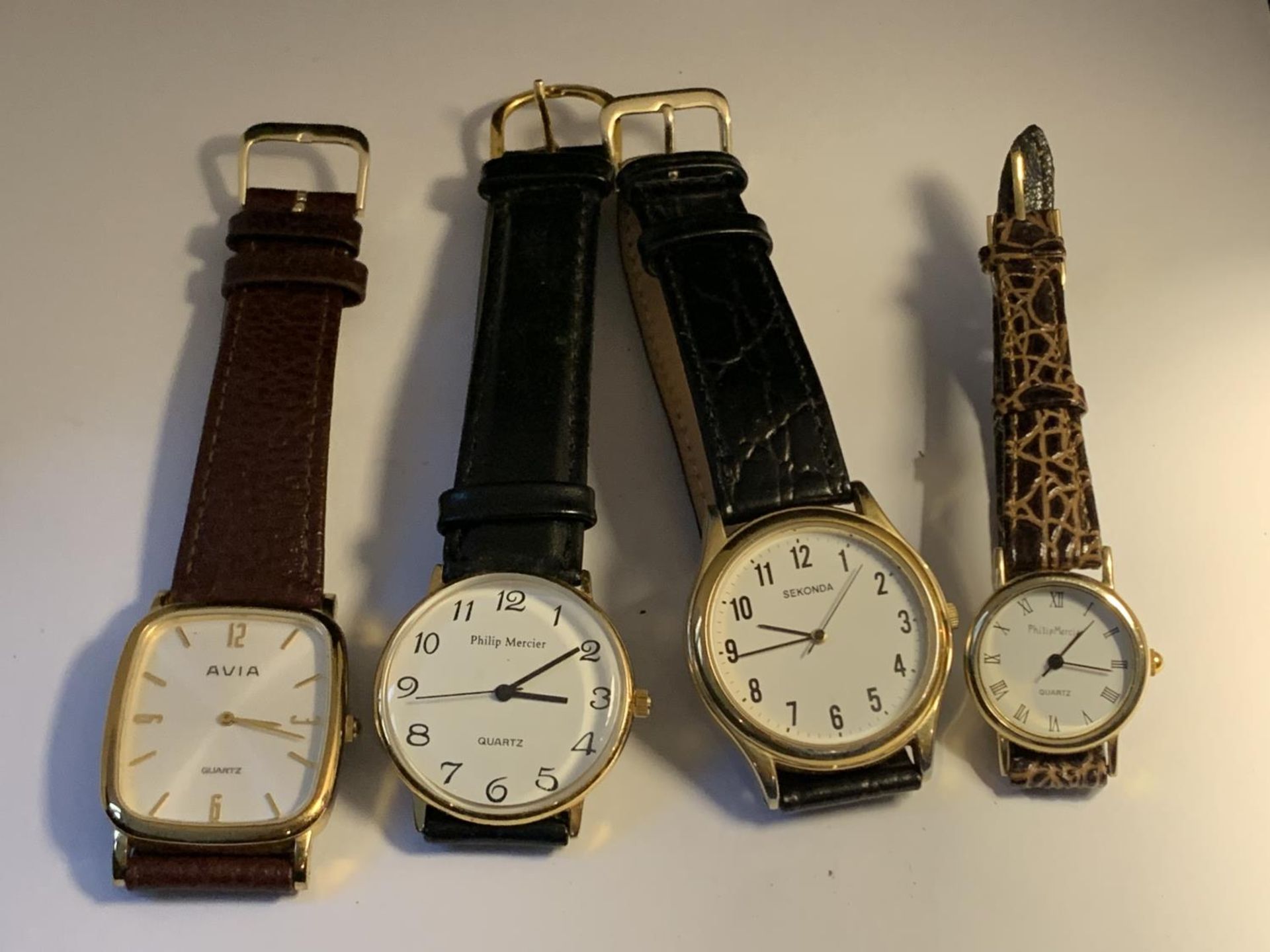 FOUR VARIOUS QUARTZ WATCHES TO INCLUDE A LADIES AND GENTS PHILIP MERCIER WATCH, AN AVIVA AND A